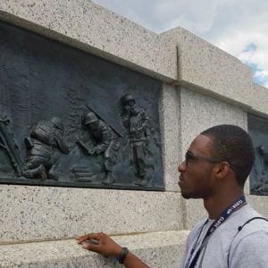 student exploring WWII memorial DC