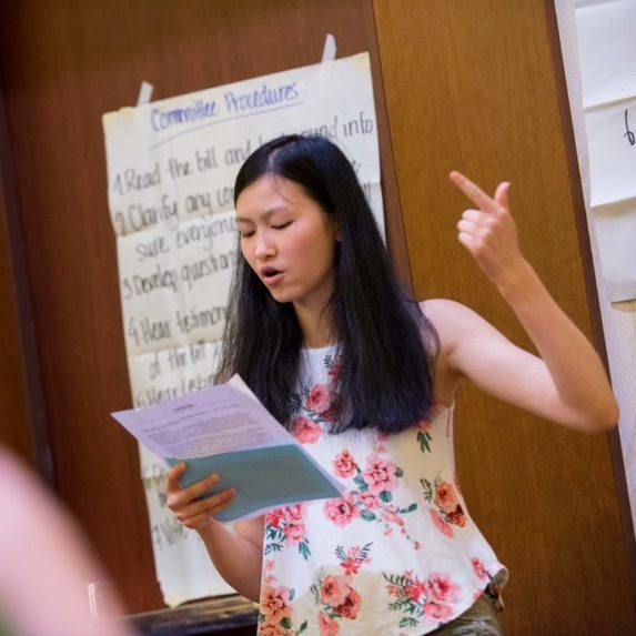 Female high school talking at mock congress