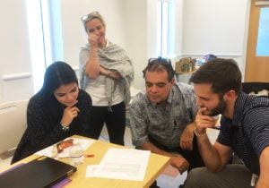 Close Up teachers analyzing notes during teacher workshop